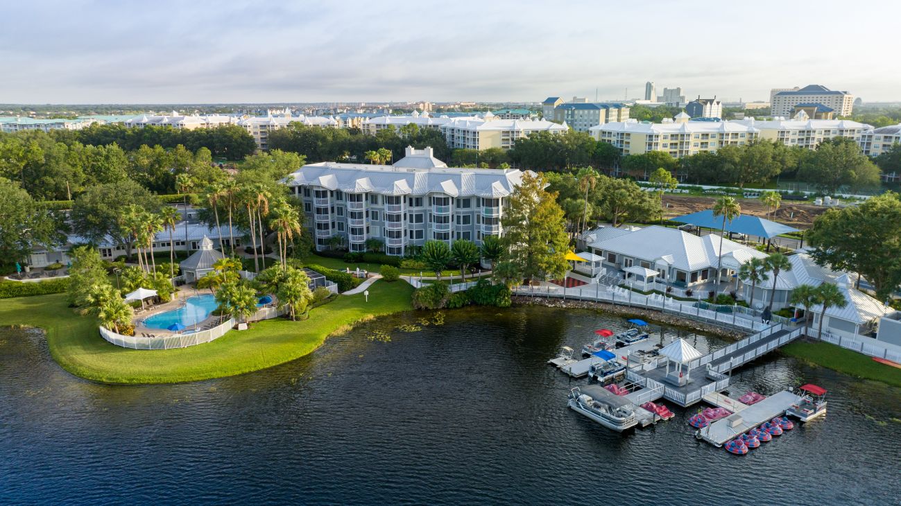 Aerial view of exterior of Marriott's Cypress Harbour resort timeshare location from the water's edge
